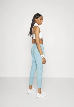 Nike Performance Essential Novelty Pant - Tracksuit Bottoms - Ocean Bliss/Silver -Clothing Category Store ffa0419c71c6404dbf20e33c46703c6e